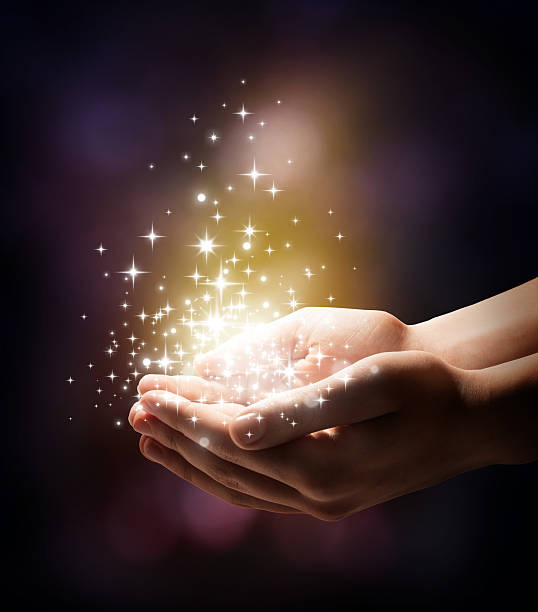 magic in your hands stardust with glowing - dark background hand holding gift stock pictures, royalty-free photos & images