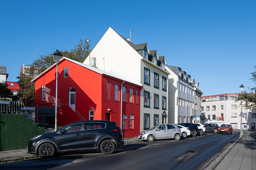 Reykjavik, Iceland - September 3, 2023 - Colorful residential street scene under sunny clear autumn sky.