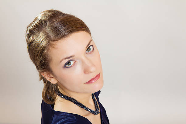 istock Young woman looking up 181471110