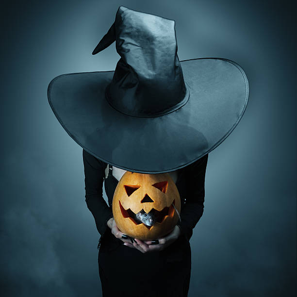 istock Halloween pumpkin and gray rat 181471117