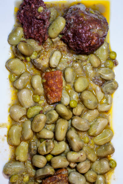 Spanish cuisine. Broad beans, Catalan style. Catalan-style broad beans. Catalan-style beans. Spanish cuisine. Broad beans, Catalan style. Habas a la catalana. Fabes a la catalana. fabes stock pictures, royalty-free photos & images
