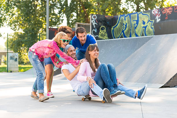 istock Young people having fun at the skatepark 181473475