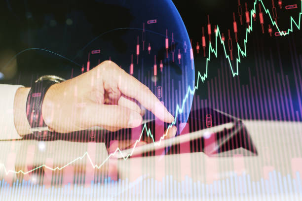 istock Multi exposure of abstract creative financial graph with world map and finger presses on a digital tablet on background, forex and investment concept 1814736123