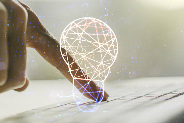 istock Double exposure of creative light bulb hologram with hands typing on laptop on background, research and development concept 1814736749