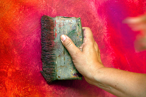 istock How to make original wall, close-up painting. 181475343