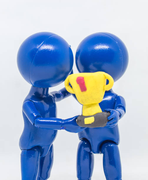 istock stick man achievement trophy 1814790994