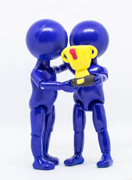 istock stick man achievement trophy 1814791030