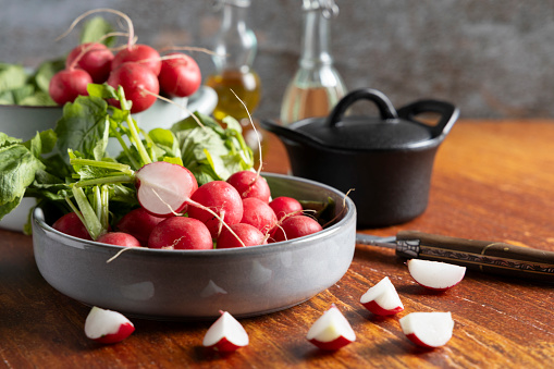 Fresh homegrown vegetable radish on a table top.
