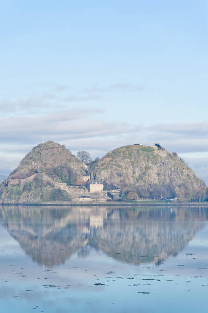 Dumbarton castle on volcanic rock overlooking the River Clyde Dumbarton castle on volcanic rock overlooking the River Clyde UK dumbarton castle stock pictures, royalty-free photos & images