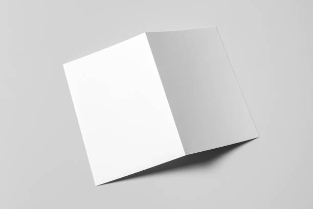 A4 Bi-Fold Brochure Mockup on Grey Background. 3D Rendering in Hand