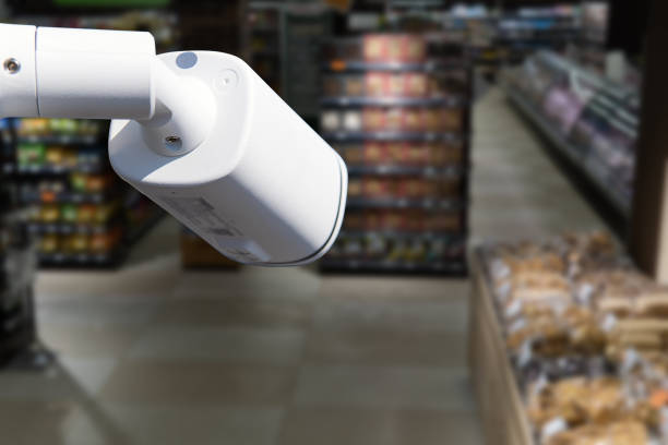 istock CCTV camera system security in shopping mall supermarket blur background.,Abstract background with Blurred people and shopping center. 1814837942