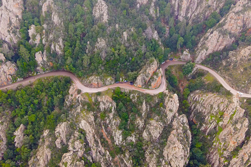 The winding roads which cross the magnificent creeks of Piana, a listed UNESCO World Heritage site in Corsica, France.