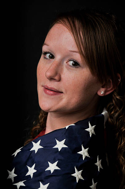 istock Woman Wrapped in a Flag 181485924