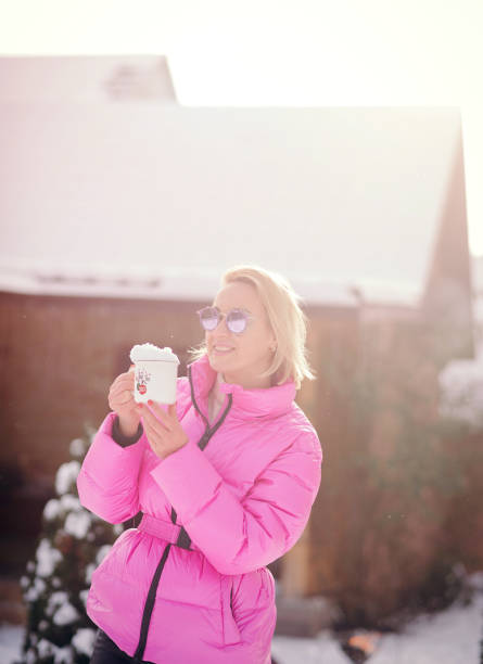 istock girl in winter with a cup 1814868419