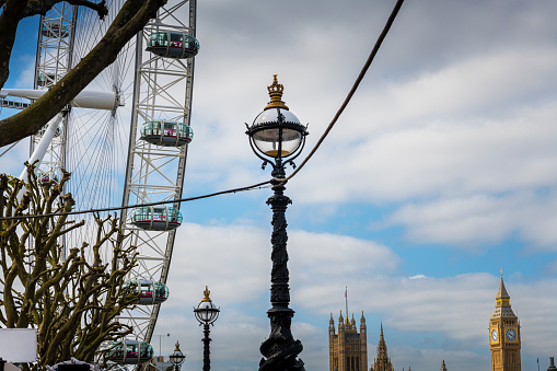 London, United Kingdom - May 30, 2023:  London Eye Millenium Wheel and Big Ben