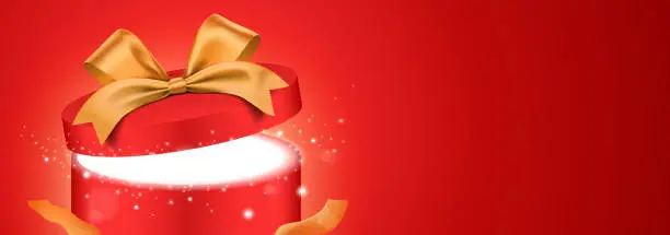 Vector illustration of Red round gift box with golden ribbon and shining glitter light. Holiday surprise gift vector banner