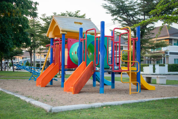 istock Empty colorful playground in a modern housing estate 1814877122