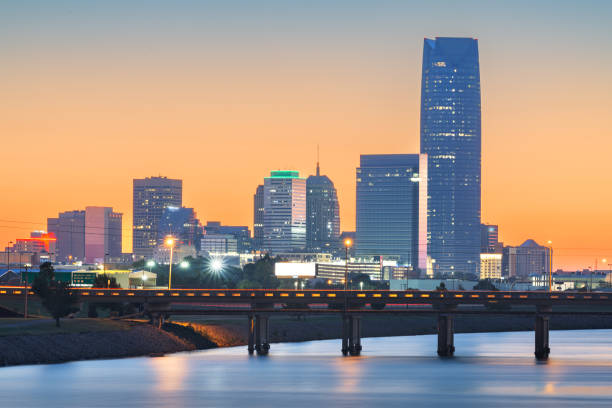 Oklahoma City, Oklahoma, USA Downtown Skyline on the Oklahoma River Oklahoma City, Oklahoma, USA downtown skyline on the Oklahoma River at dawn. oklahoma city stock pictures, royalty-free photos & images