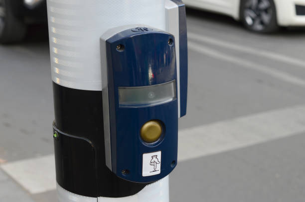 istock Traffic light switch button installed on the pole on the sidewalk for pedestrians 1814895218