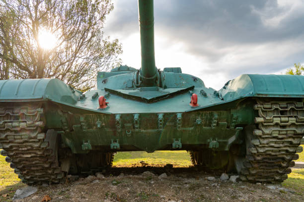 istock Soviet-made old green T-72 tank from the front and from below 1814900821