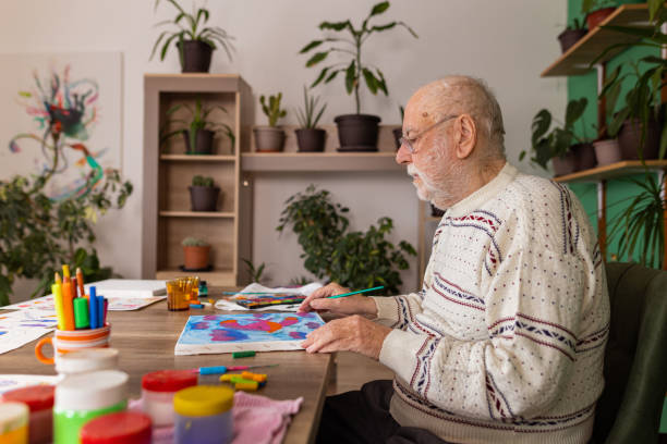 istock Lonely man painting at her home 1814901864