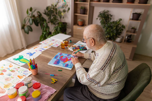 istock Lonely man painting at her home 1814901866