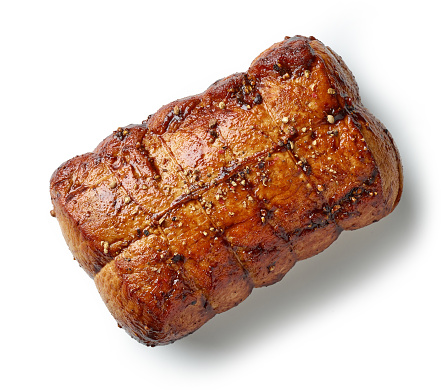 whole spicy roast pork isolated on white background, top view