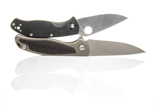 istock two folding knives on a white background. item for tourism and survival. 1814925635