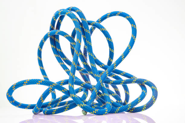 istock durable colored rope for climbing equipment on a white background. climbing rope. coil of braided cable. item for tourism and travel 1814926365