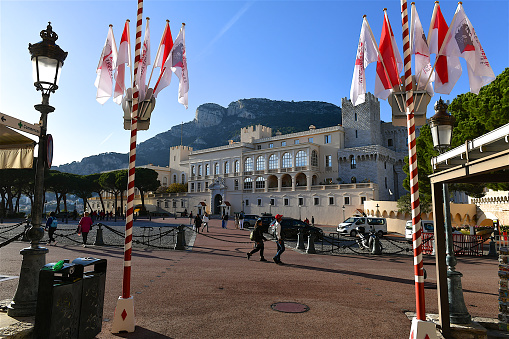 Monaco, Monaco-11 20 2023: Tourists passing on the square in front of the Princely Palace of Monaco.