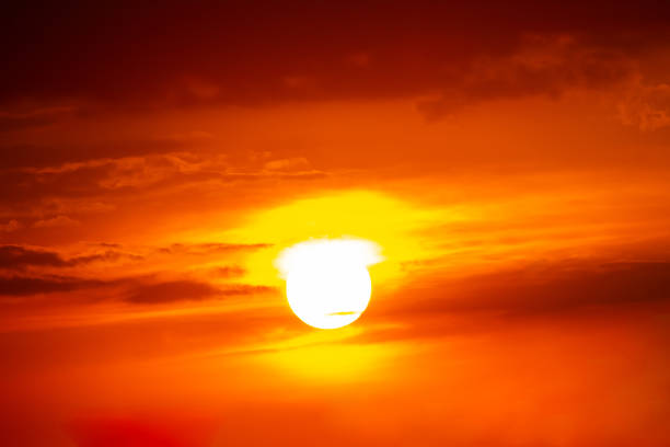 istock brightly colorful clouds in the evening sky. Lush colored clouds in the sky before sunset. dawn in the clouds 1814939545