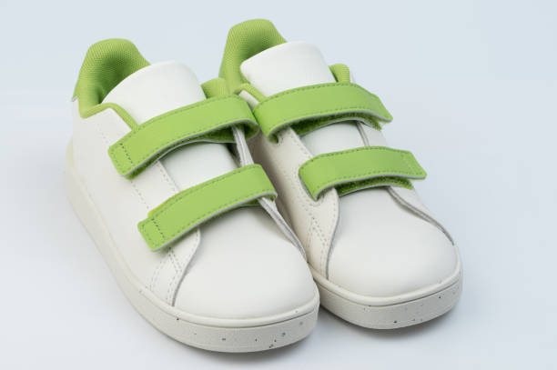 istock Kids white leather sneakers shoes 1814940620