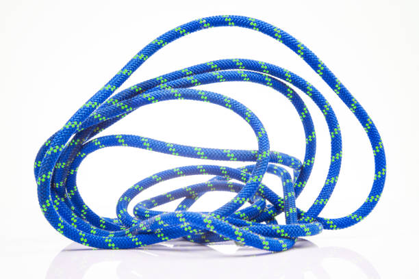 istock durable colored rope for climbing equipment on a white background. climbing rope. coil of braided cable. item for tourism and travel 1814943290