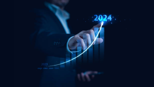 istock 2024 Business growth, target and goal plan, New year business strategy and challenge. Development to success. Economic indicators. Businessman drawing line for increasing arrow from 2023 to 2024. 1814962916