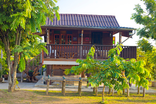 Wooden thai house with porch in landscape at Mekong river in Chiang Khong, Chiang Rai province.