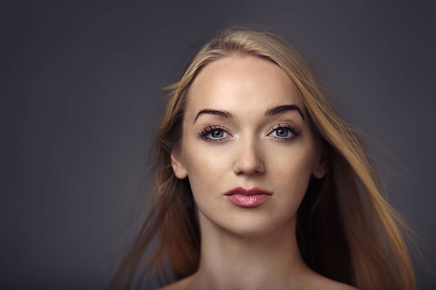 istock blonde hair blowing 181498471