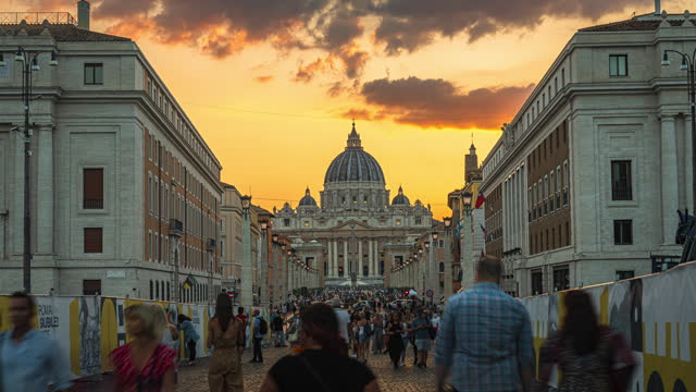 Time lapse of Crowd of People tourism walking and sightseeing attraction at St Peter's Basilica in Vatican City at sunset time, Rome, Italy,
