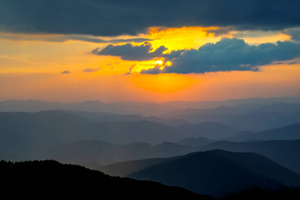istock brightly colorful clouds in the evening sky. Lush colored clouds in the sky before sunset 1814994166