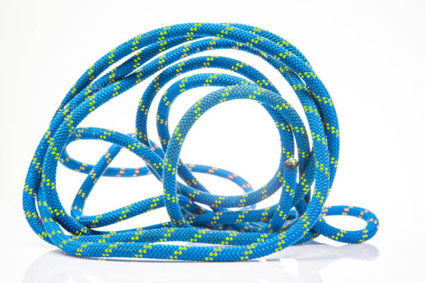istock durable colored rope for climbing equipment on a white background. climbing rope. coil of braided cable. item for tourism and travel 1815000104