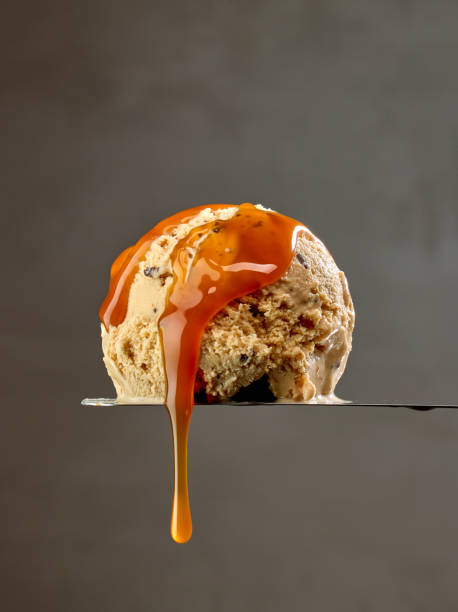 istock ice cream scoop with caramel sauce 1815001728