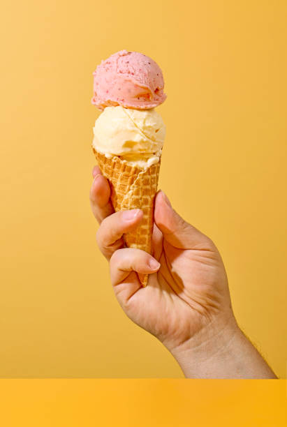 istock ice cream in human hand 1815002275