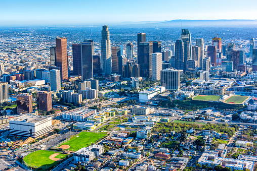 The downtown and surrounding areas of Los Angeles, California shot via helicopter from an altitude of about 1100 feet.