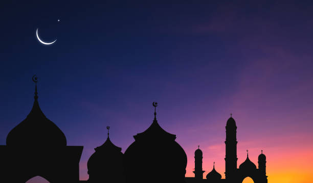 istock Silhouette Mosque Domes with Crescent moon and stars on dark blue Twilight sky Background 1815009771
