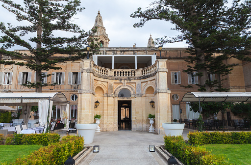 Naxxar, Malta - August 31, 2019: Palazzo Parisio view taken from its gardens, formerly known as Scicluna Palace, Palazzo Scicluna and officially Palazzo Parisio and Gardens