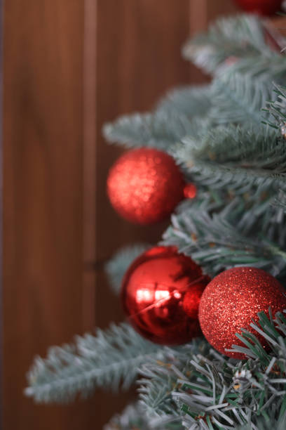 istock Green Christmas tree with  Red Ball and light for winter season. 1815016055