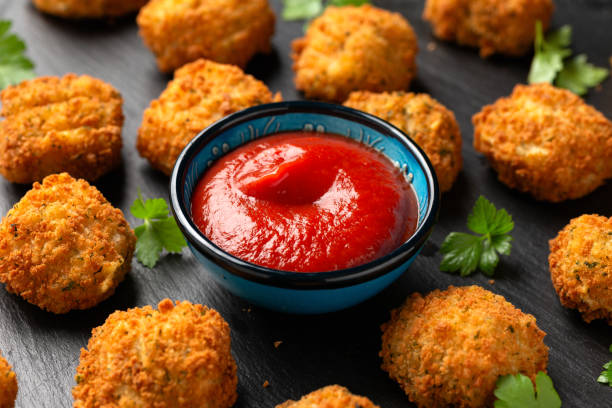 istock Potato croquettes with ham and cheese on stone board 1815020344