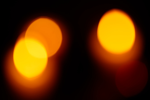 Abstract Defocussed Orange Lights on Dark Background, Christmas and New Year Background