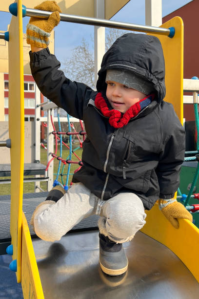 istock A cute agile boy is ready to skate on the playground 1815061289