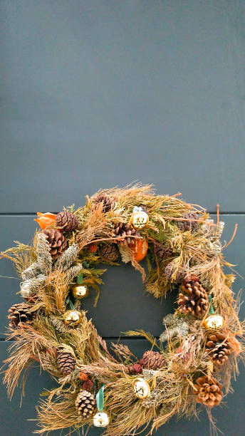 istock Decorative garland on front door. Christmas decorations. 1815069377