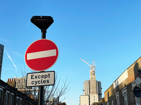 No entry sign, except for cycles and a construction site in Walthamstow, London. November 2023